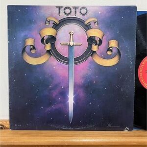 Toto Self Titled Vinyl Record
Record is in EX condition. Original Record